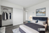 Contemporary bedroom with stylish decor, showcasing a plush bed, modern art, and a sleek open closet for an elegant living experience.