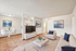 Bright and inviting living room with modern furniture, stylish decor, and a dining area, perfect for comfortable entertaining. Virtually staged for a contemporary feel.