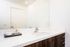 bathroom vanity with quartz countertop at arte west apartments