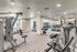 State-of-the-Art Two-Story Fitness Center with Spin/Yoga Room with Wellbeats