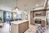 kitchen with vinyl wood like flooring and stainless steel appliances at Arte Apartments