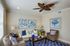 staged living room with ceiling fan