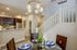 Dining room next to stairs and kitchen