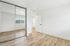 bedroom with large mirrored closets