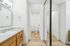 bathroom with large closets