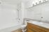 bathroom with full size tub and shower