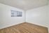 bedroom with large windows and closet