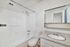 bathroom with shower tub sink and toilet
