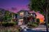 Paseo Village exterior of a townhouse with a sunset in the background