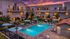 Pool area at breeze hill with a sunset