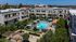 Aerial photo of Breeze Hill community with buildings and pool/courtyard in the middle