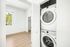 Laundry room at Creekside with washer and dryer
