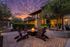 Firepit area at creekside with a sunset