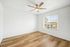 bedroom with wooden floor and ceiling fan