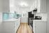 kitchen with wooden floor and appliances