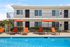 swimming pool with lounge chairs