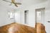 apartment with wooden floor and windows and ceiling fan