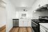 white kitchen with appliances