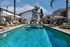 swimming pool with loungers