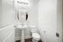 bathroom with sink and toilet