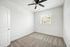 bedroom with carpet and ceiling fan