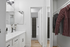 digitally enhanced bathroom with closet