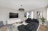 updated living room with wood style flooring