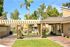 grassy courtyard and walkway to clubhouse and pool at Silver Creek Apartments