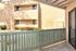 patio-balcony with green fencing at Silver Creek Apartments