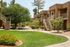 common area with walkways and 2 story apartment building in the back at metro on main