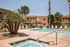 pool with lounge chairs and community bbq area at Metro on Main