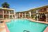 pool with lounge chairs and poolside cabana at solaris at the biltmore
