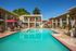 pool with colorful chairs and lounge chairs at Solaris at The Biltmore