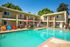pool with colorful chairs and lounge chairs at Solaris at The Biltmore