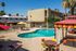 pool with colorful chairs and lounge chairs at Solaris at The Biltmore