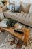 livingroom - close up of beige sofa and coffee table with decorative items