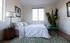 bedroom with bed and night stand at oasis 20