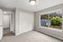 Large bedroom with big windows