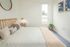 furnished rendering of bedroom with bed and side table at twelve mile crossing