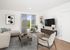 rendering of Living room with sofa and tv console and Wood-Style Flooring at Twelve Mile Crossing