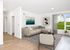 rendering of Living room with sofa and tv console and Wood-Style Flooring at Twelve Mile Crossing