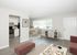 virtually staged living room with vinyl wood like flooring with coffee table at 81 powell apartments