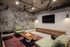 Pearl District Portland Apartments - ORO - An shot of The Lounge with Leather Sofa and Arm Chairs