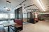 the mezz-semi private booths and sitting area with kitchen at oro apartments