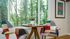 trendy lounge seats with a peaceful view of the woods