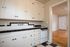 vintage style kitch with wood flooring