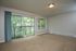 large living space with private patio that opens up to trees