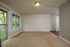 large living space with private patio that opens up to trees