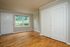 livingroom with wood flooring and large closets