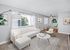 cozy living room with carpet and dining nook